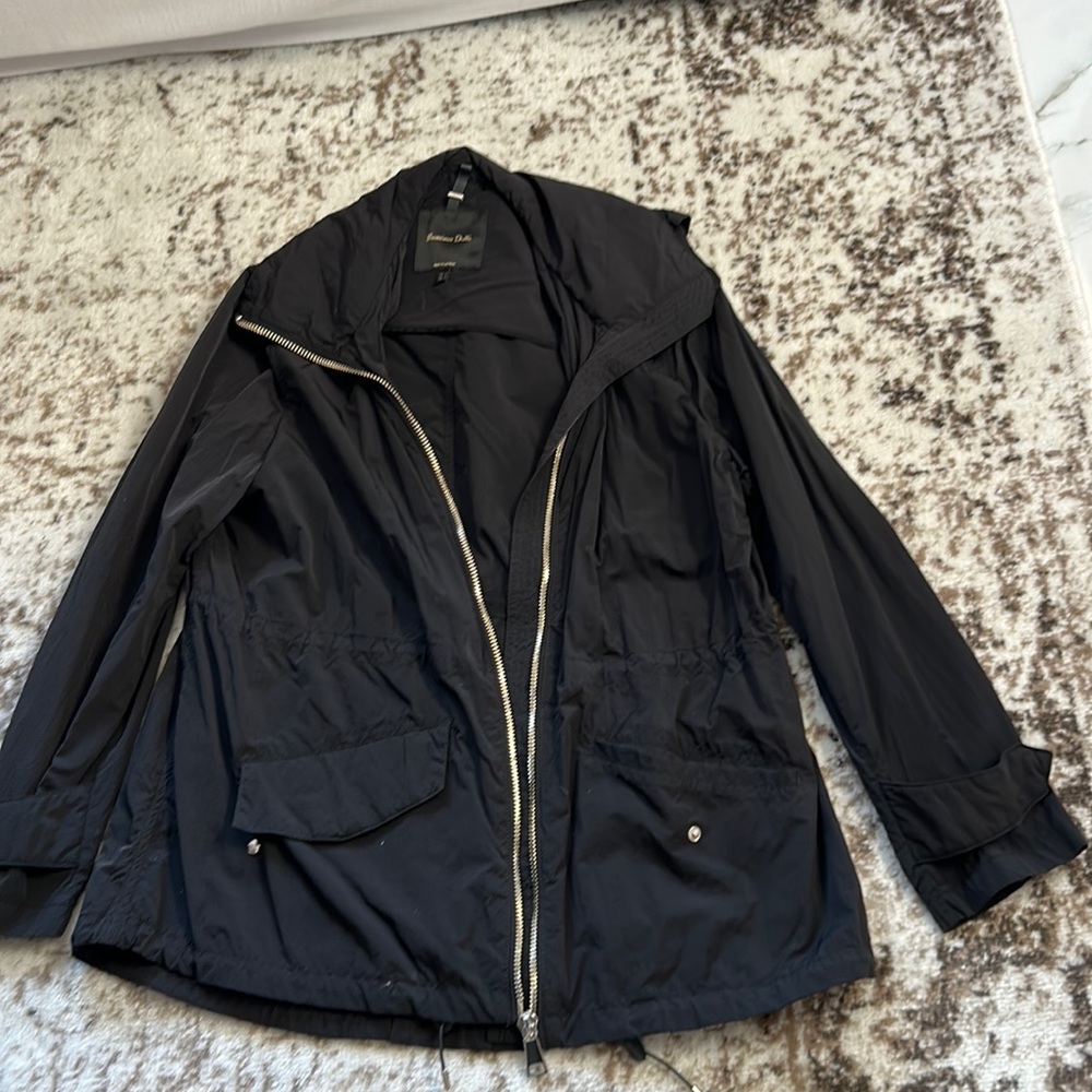 Women XL wind breaker jacket with a hoodie in black color